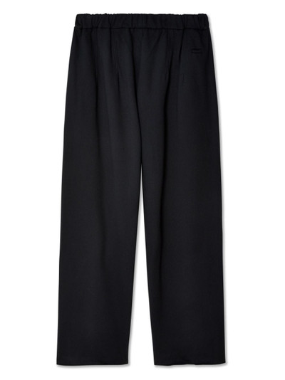 RANDOM IDENTITIES detailed-pocket wide-leg trousers outlook