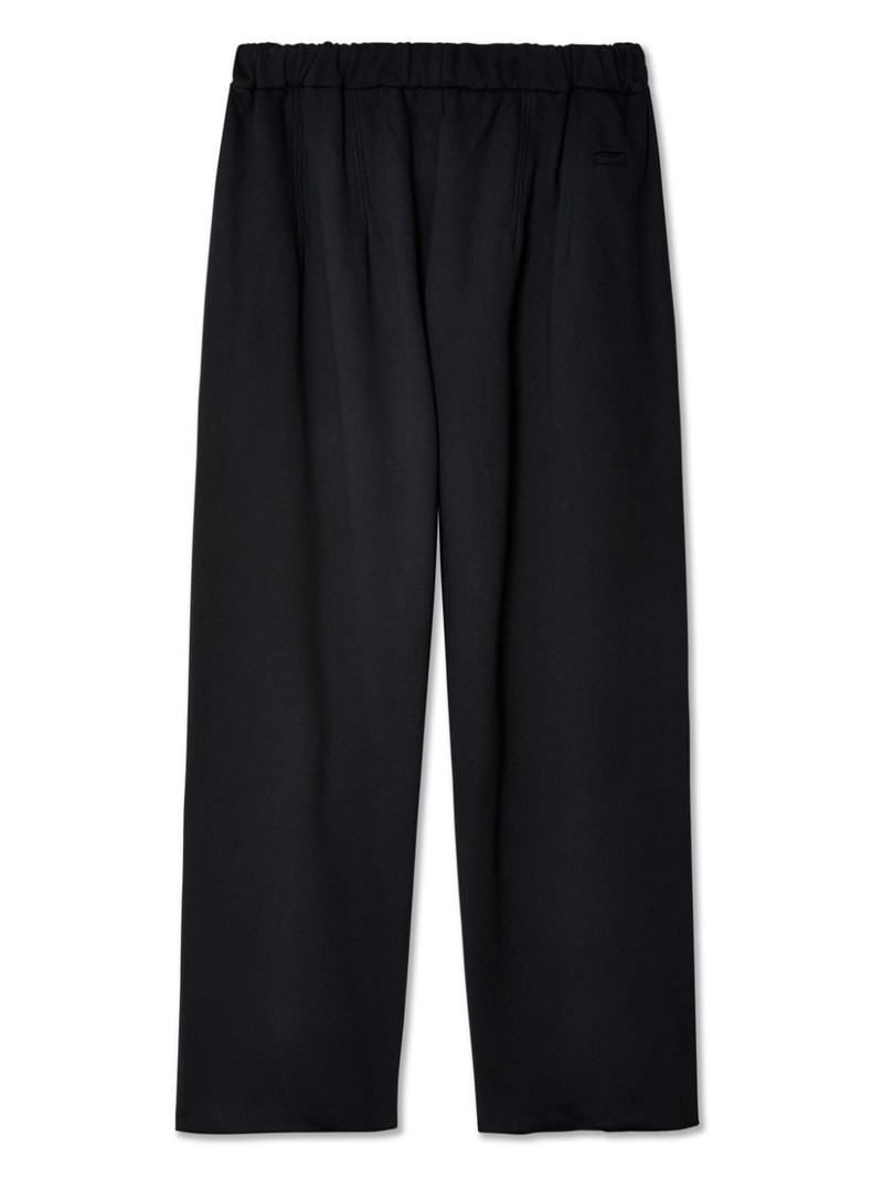 RANDOM IDENTITIES detailed-pocket wide-leg trousers outlook