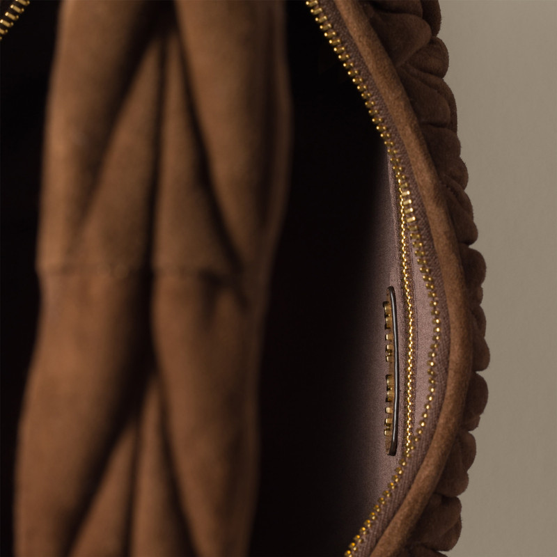 Wander matelassé suede bag 4