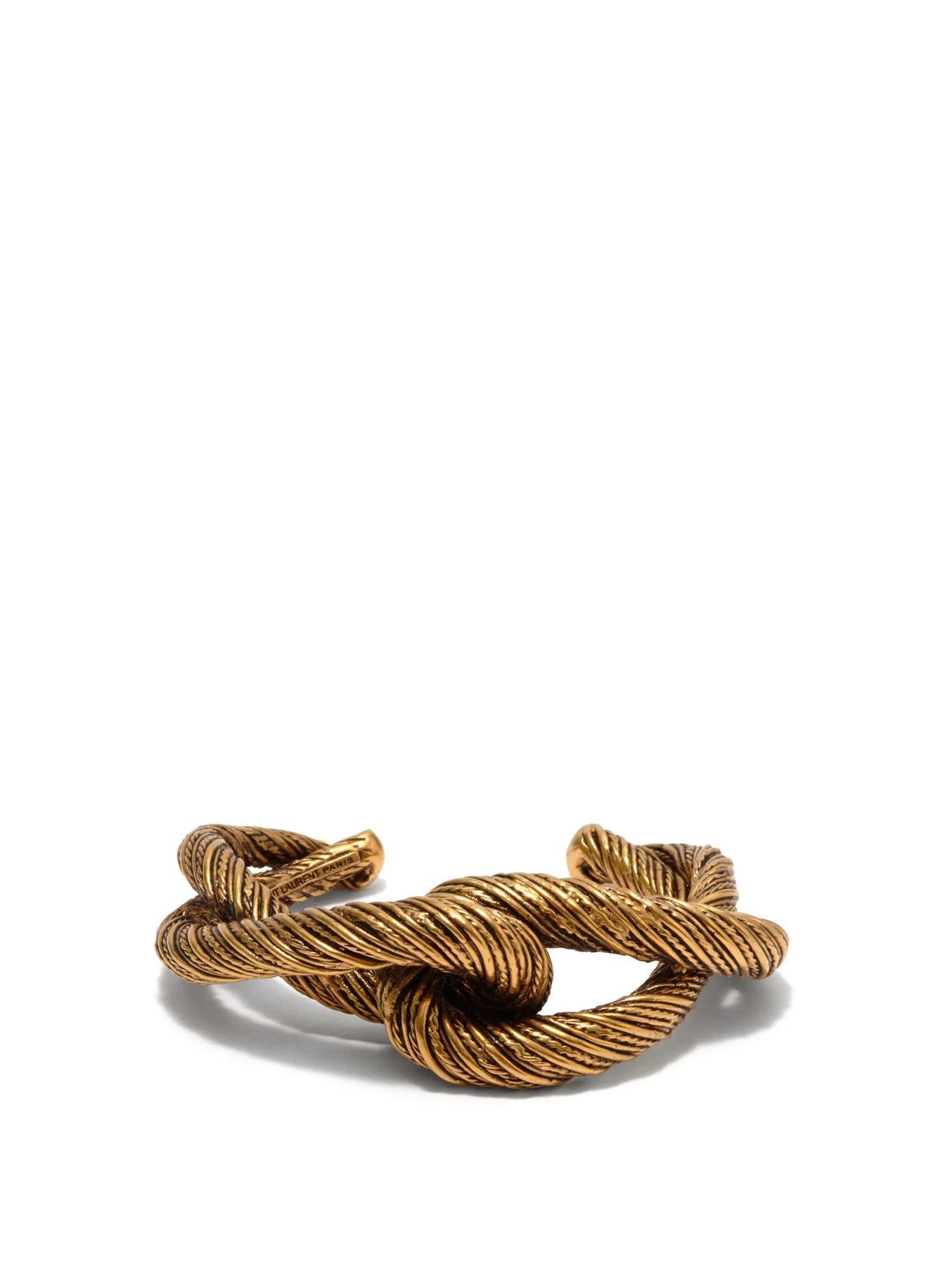 Twisted interlocking cuff - 1