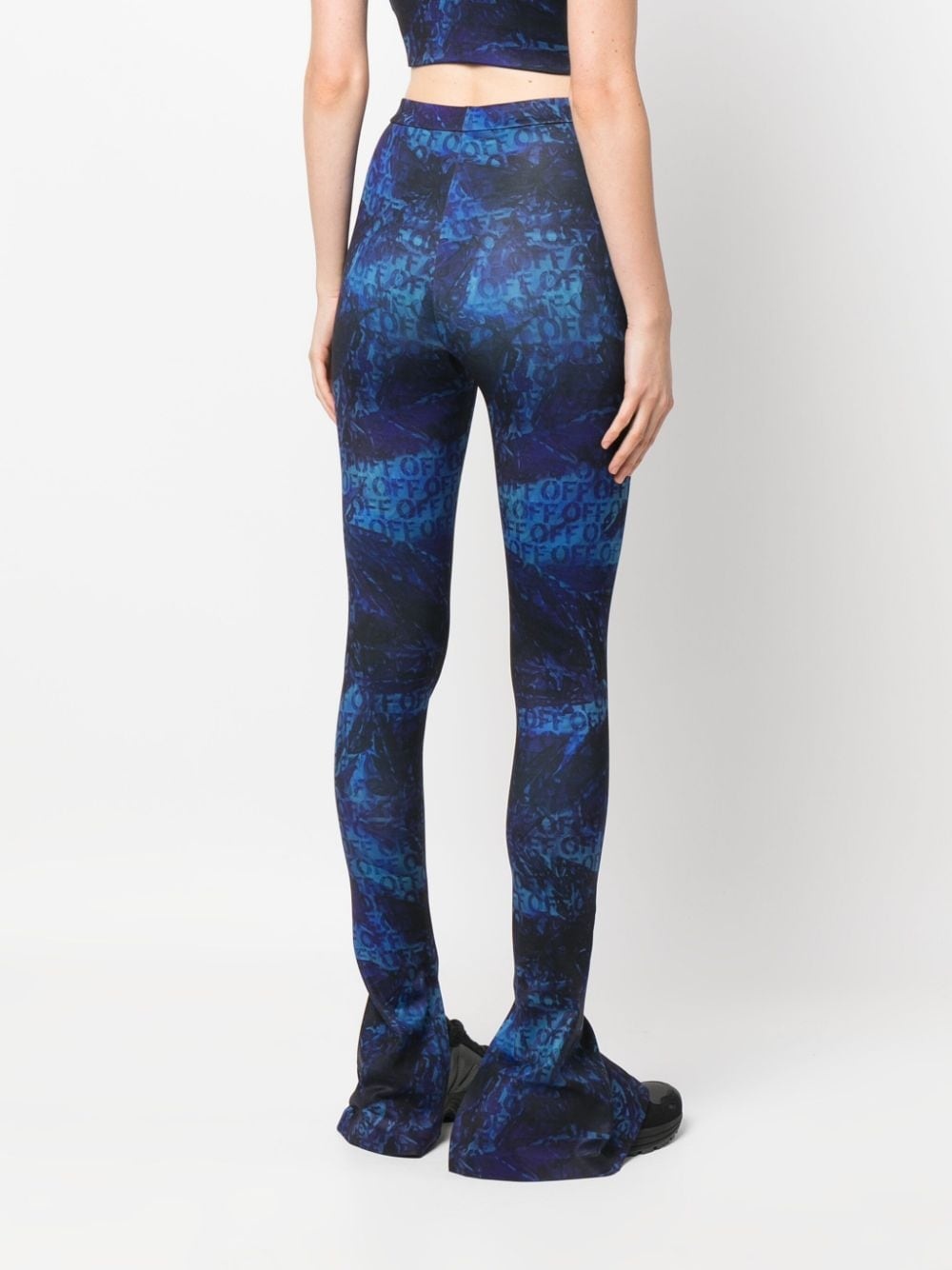 all-over logo-print flared trousers - 4