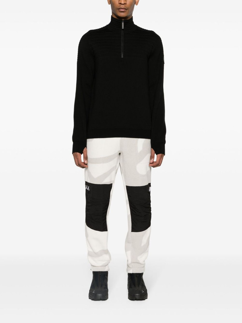The North Face x KAWS Retro 1995 Denali track pants outlook