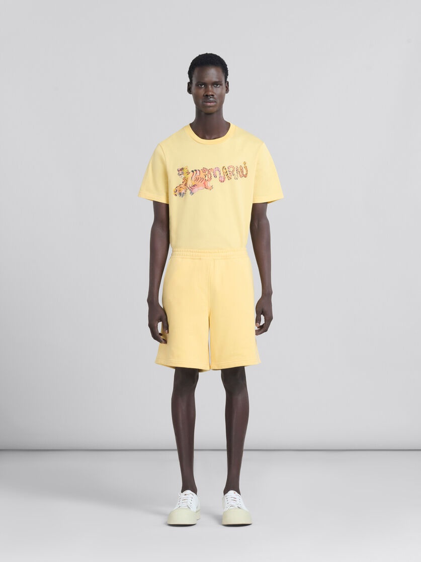 YELLOW ORGANIC JERSEY SWEAT SHORTS WITH MARNI MENDING - 1