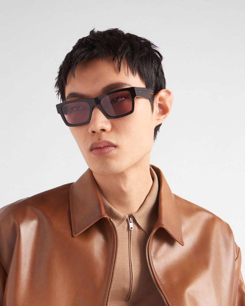 Prada Sunglasses with iconic metal plaque outlook