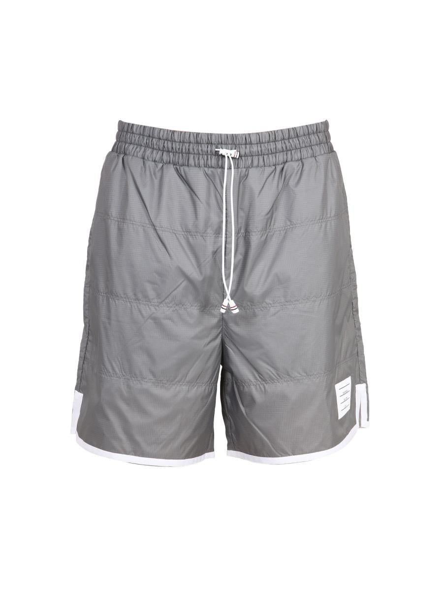 Tシャツ・カットソー THOM BROWNE SPORTY RIPSTOP BERMUDA SHORTS WITH JERSEY LINING Thom Browne THOM BROWNE SPORTY RIPSTOP BERMUDA | baltini