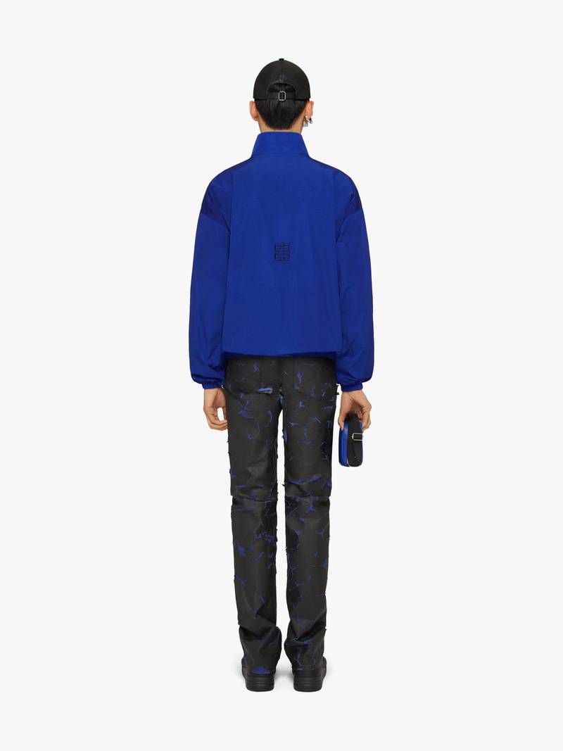 JEANS IN PAINTED CRACKED DENIM WITH ZIPPERS 4