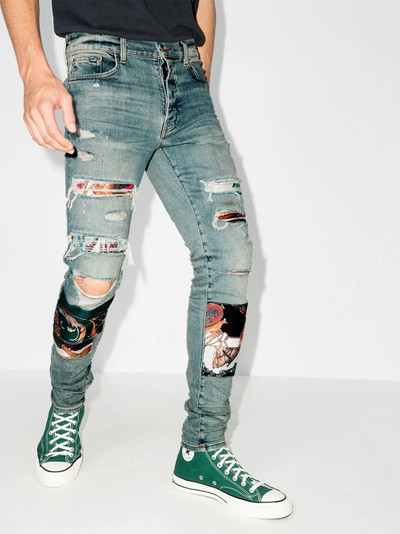 AMIRI scarf-panel distressed skinny jeans outlook