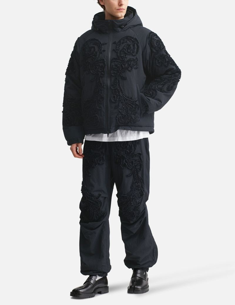 TAAKK SCULPTURE TRACK PANTS outlook