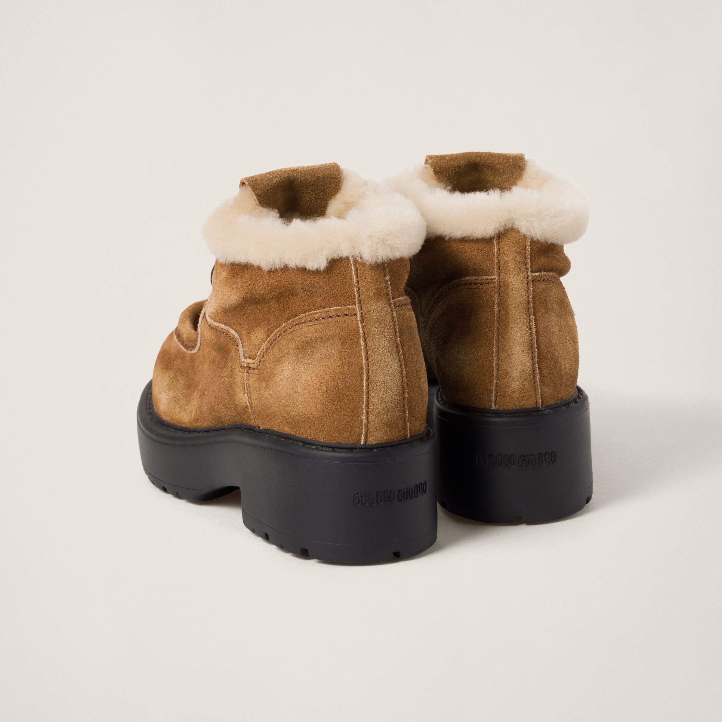 Miu Miu Faded suede booties | REVERSIBLE