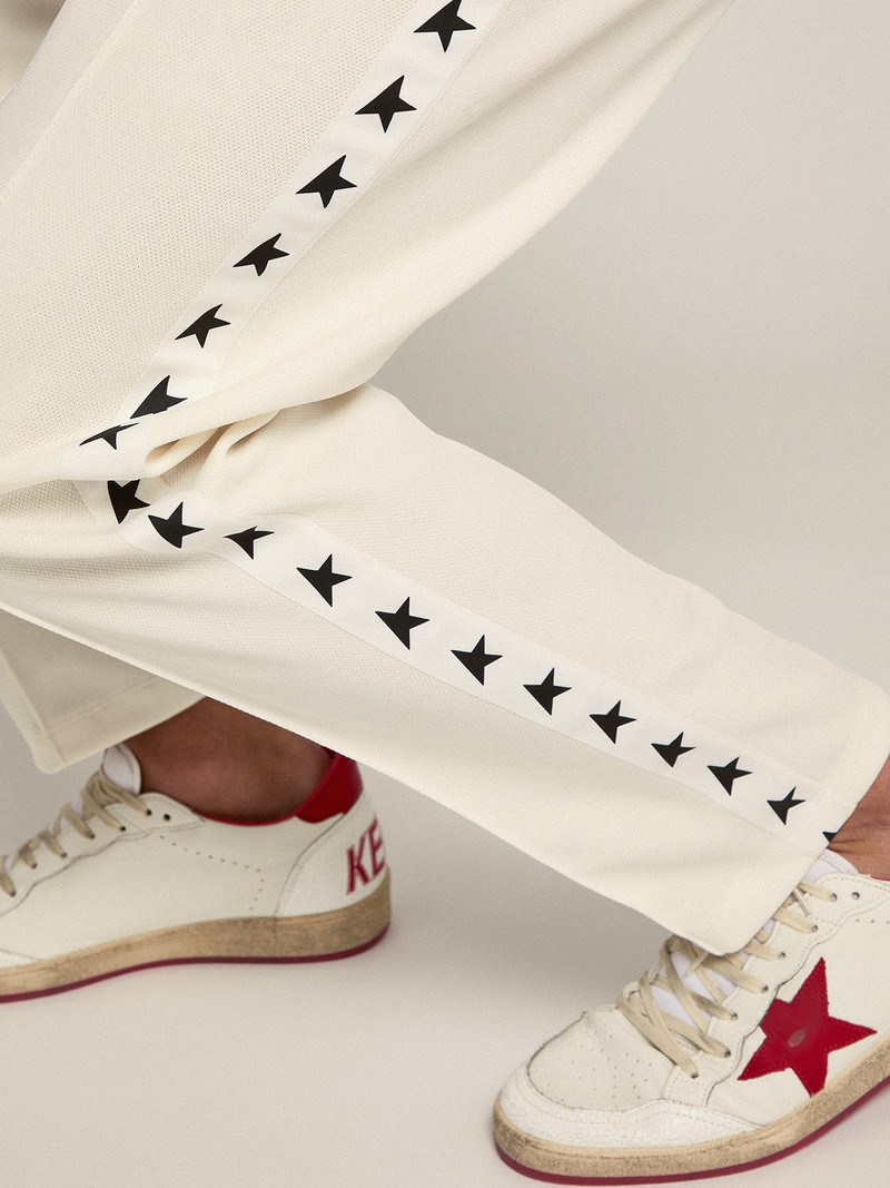 Golden Goose Men's white joggers with black stars on the sides outlook
