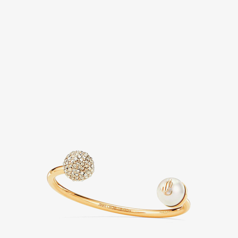 JC Crystal Cuff
Gold-Finish Metal Cuff Bracelet with Pearl and Swarovski Crystal Embellishment 4