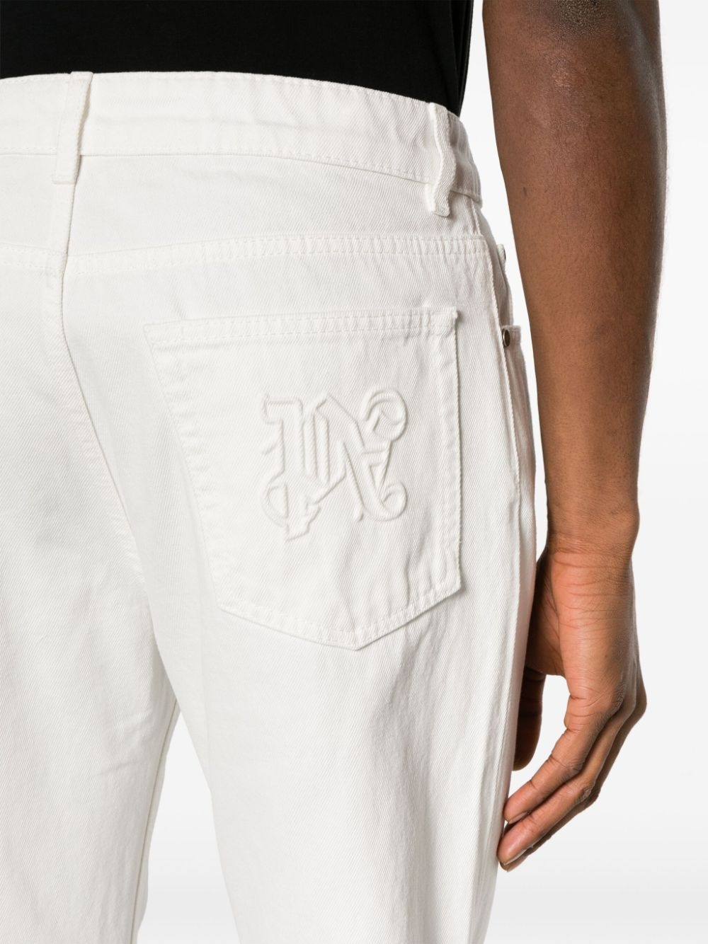 logo-embossed straight jeans - 5