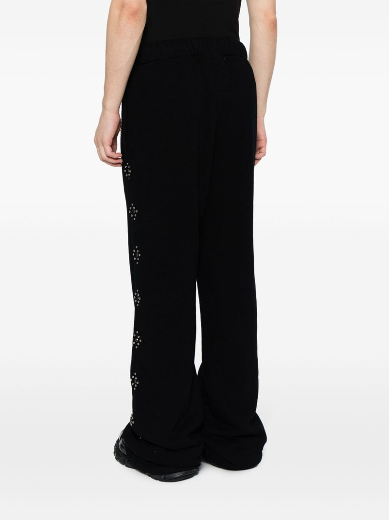 bead-embellished Western-style track pants 4