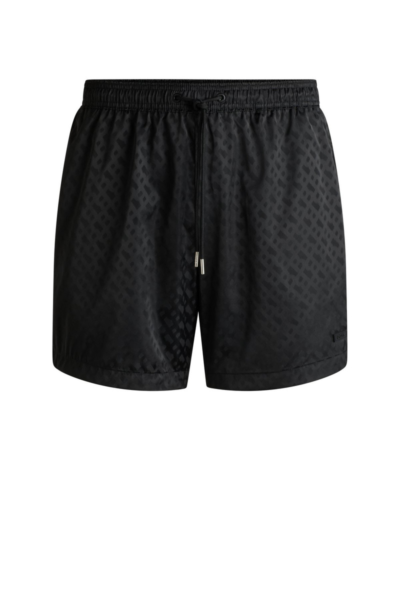 SWIM SHORTS WITH ALL-OVER TONAL MONOGRAMS 1