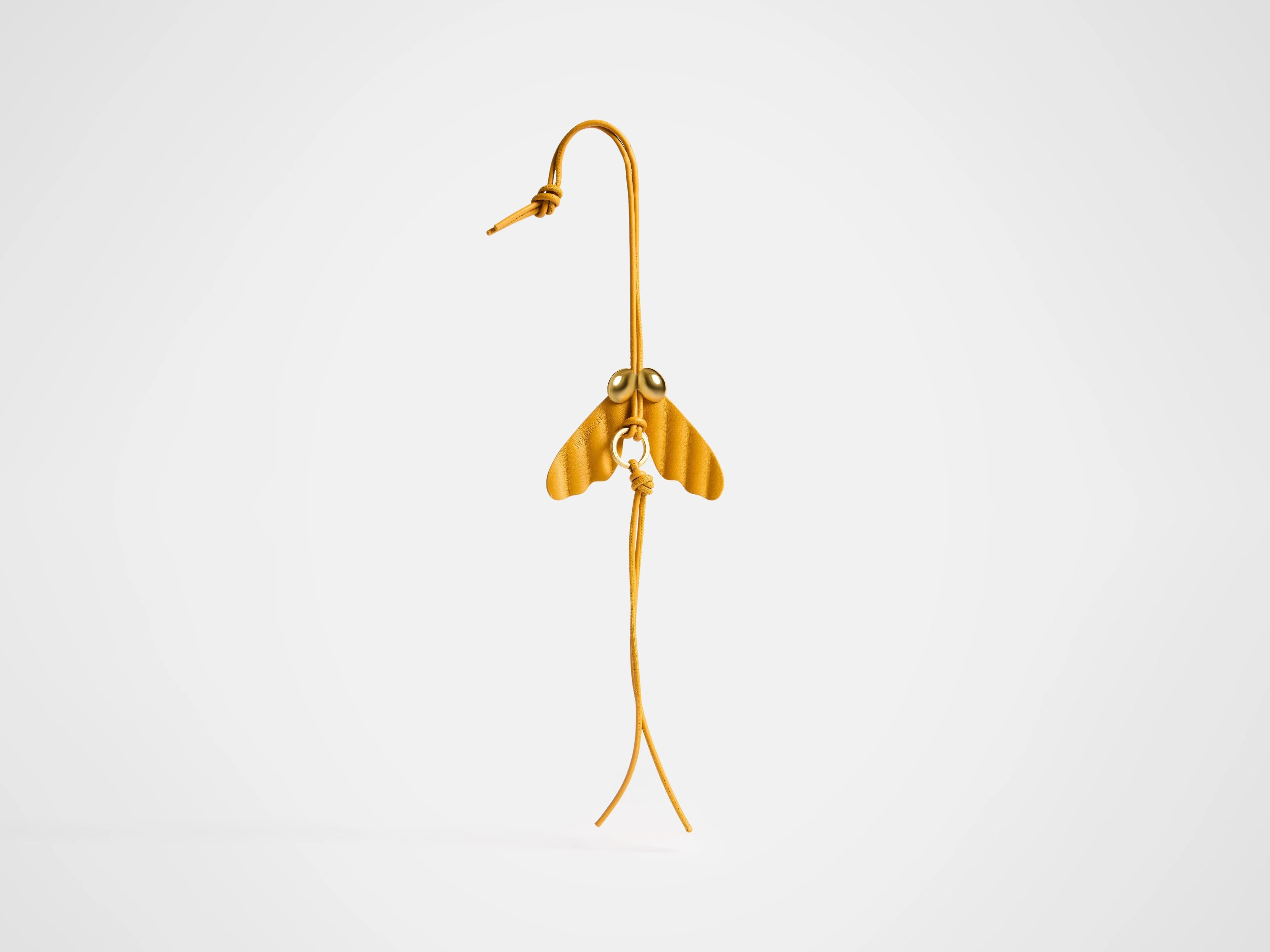 LEATHER HELICOPTER SEED CHARM - 1