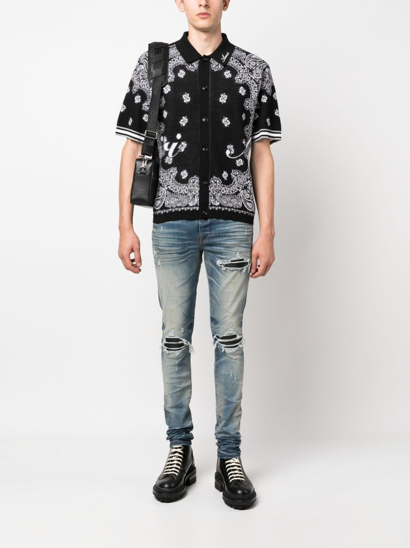 AMIRI distressed skinny jeans outlook