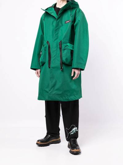 UNDERCOVER x Eastpak side-pockets coat outlook