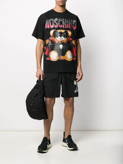 Moschino logo print track shorts outlook