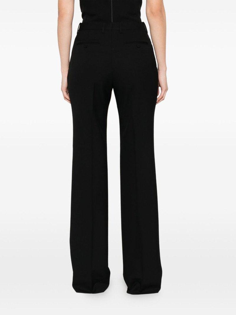 buttoned-pocket trousers 4