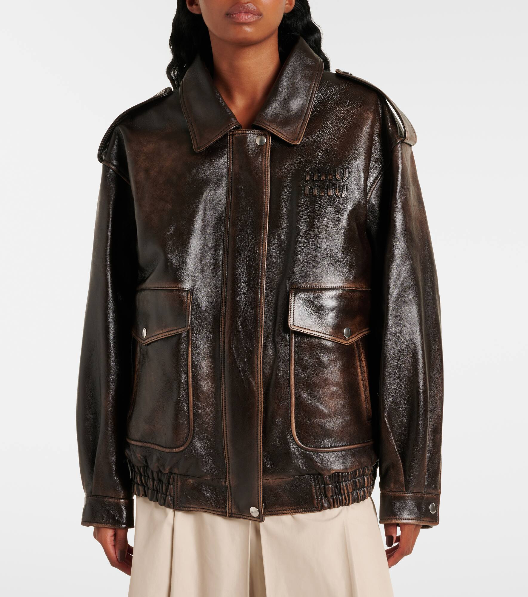 Logo faux shearling-trimmed leather jacket - 7