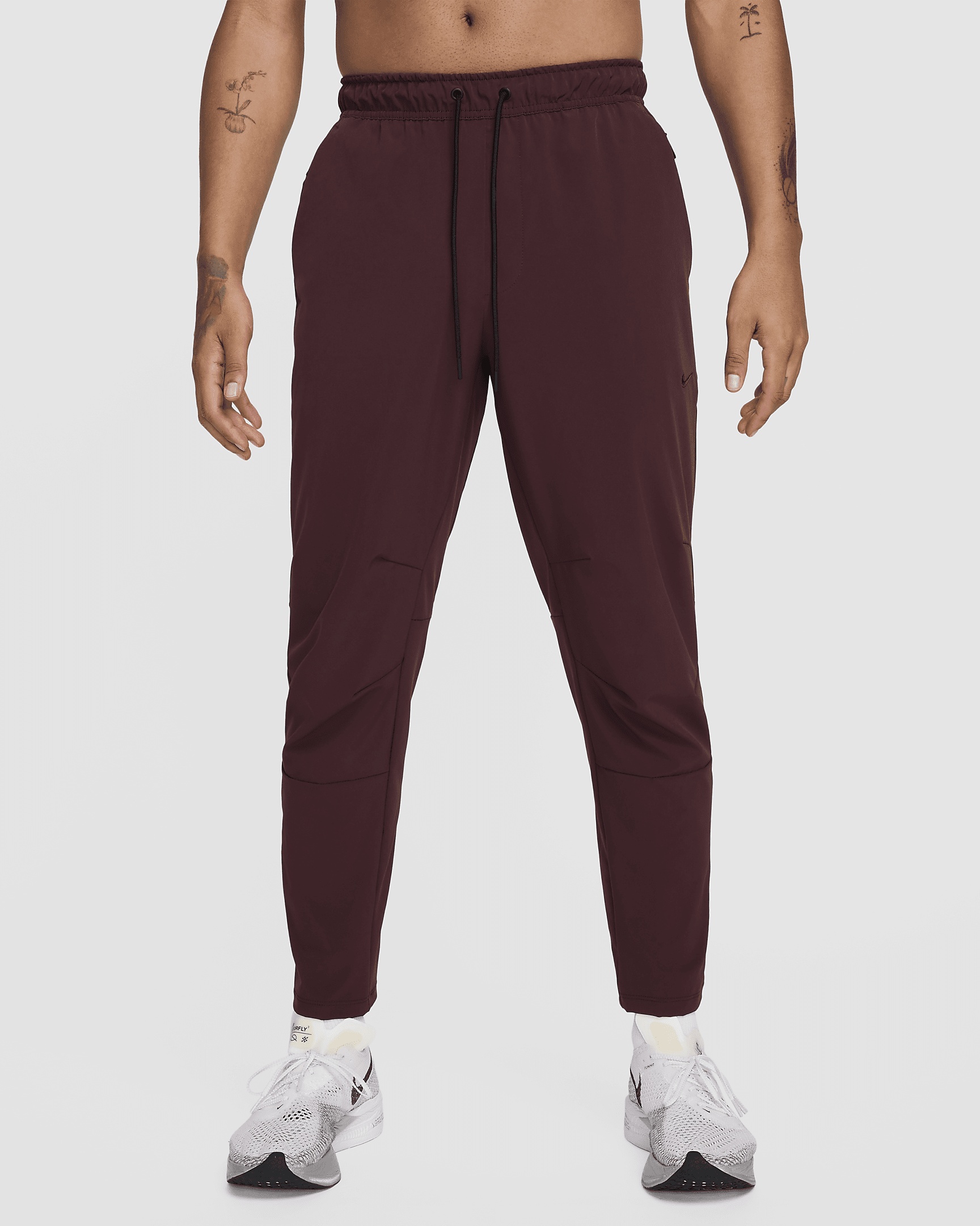 Nike Unlimited Men's Dri-FIT Tapered Leg Versatile Pants - 1