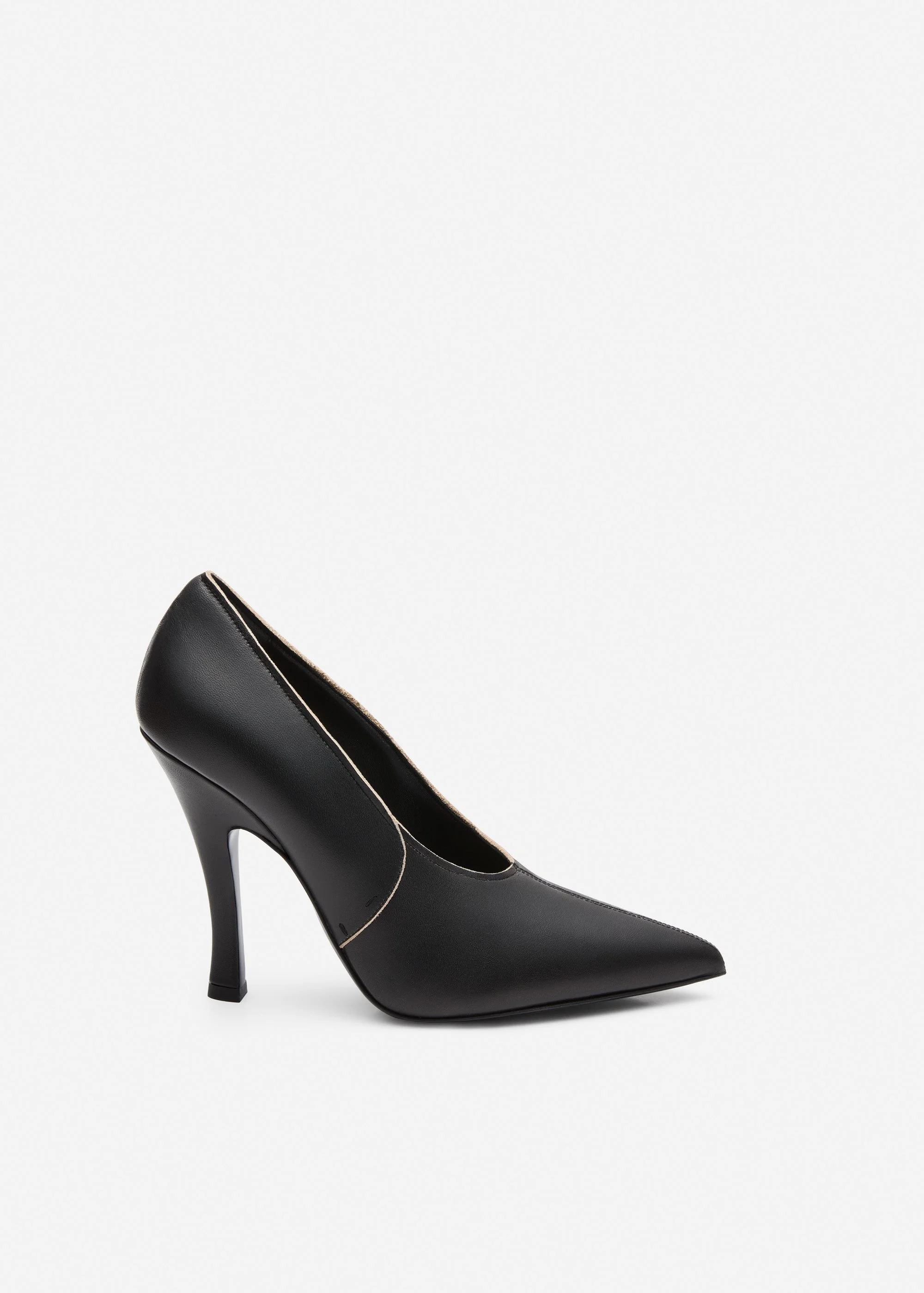 Sculptural pointed leather pumps in black - 1