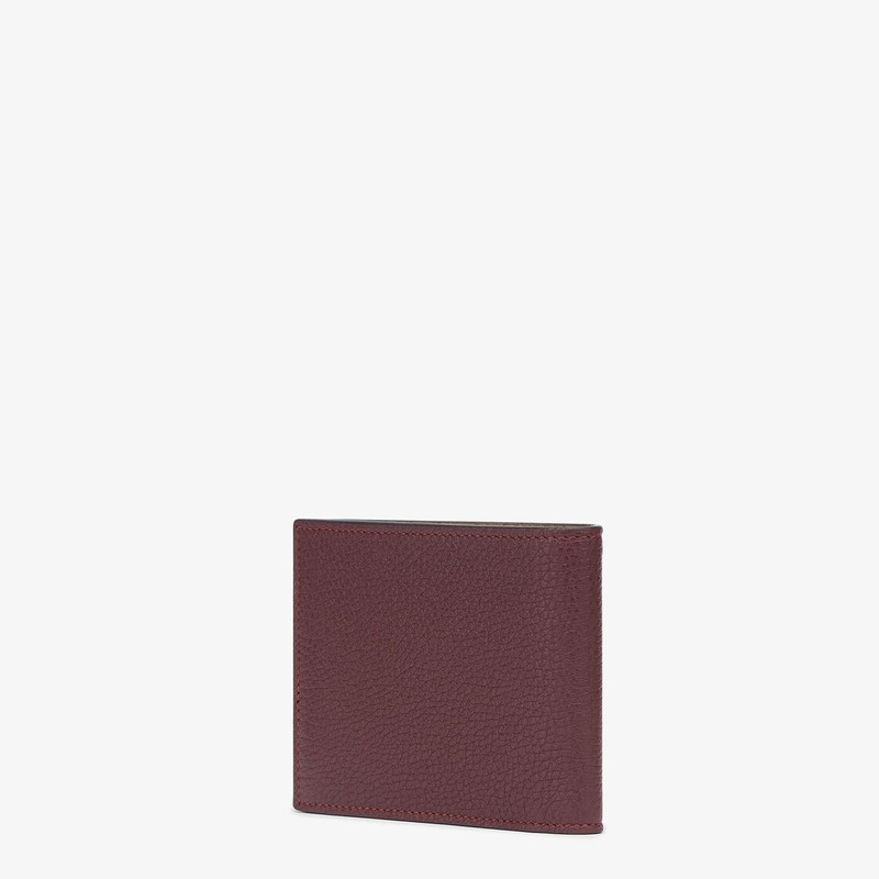 Wallet with eight interior card slots and two compartments for banknotes. Made of burgundy Cuoio Rom 2