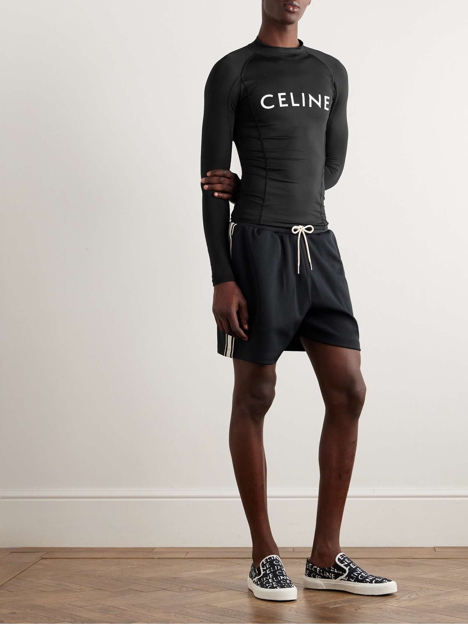 【CELINE】ロゴプリント UVカットライクラ製サーフTシャツ/black CELINE Surf Logo-Print Stretch-Jersey T-Shirt | mrporter
