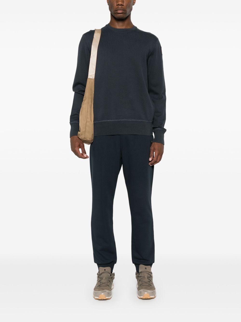 Makalu logo-appliqué tapered trousers - 2
