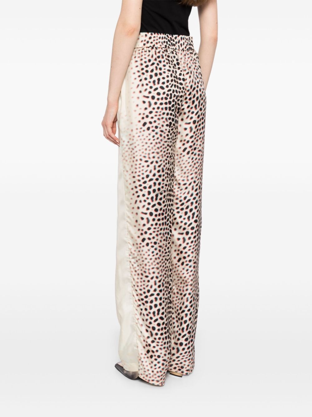 graphic-print straight trousers - 4