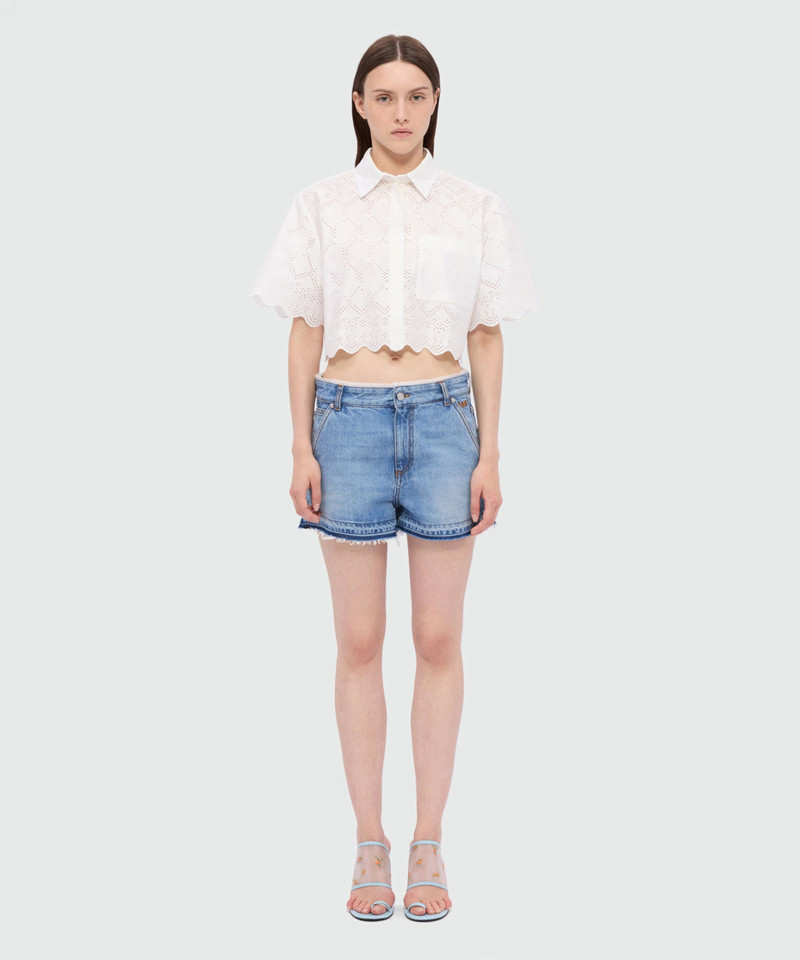 MSGM Light blue stone-washed denim shorts with lace detail at the waist outlook