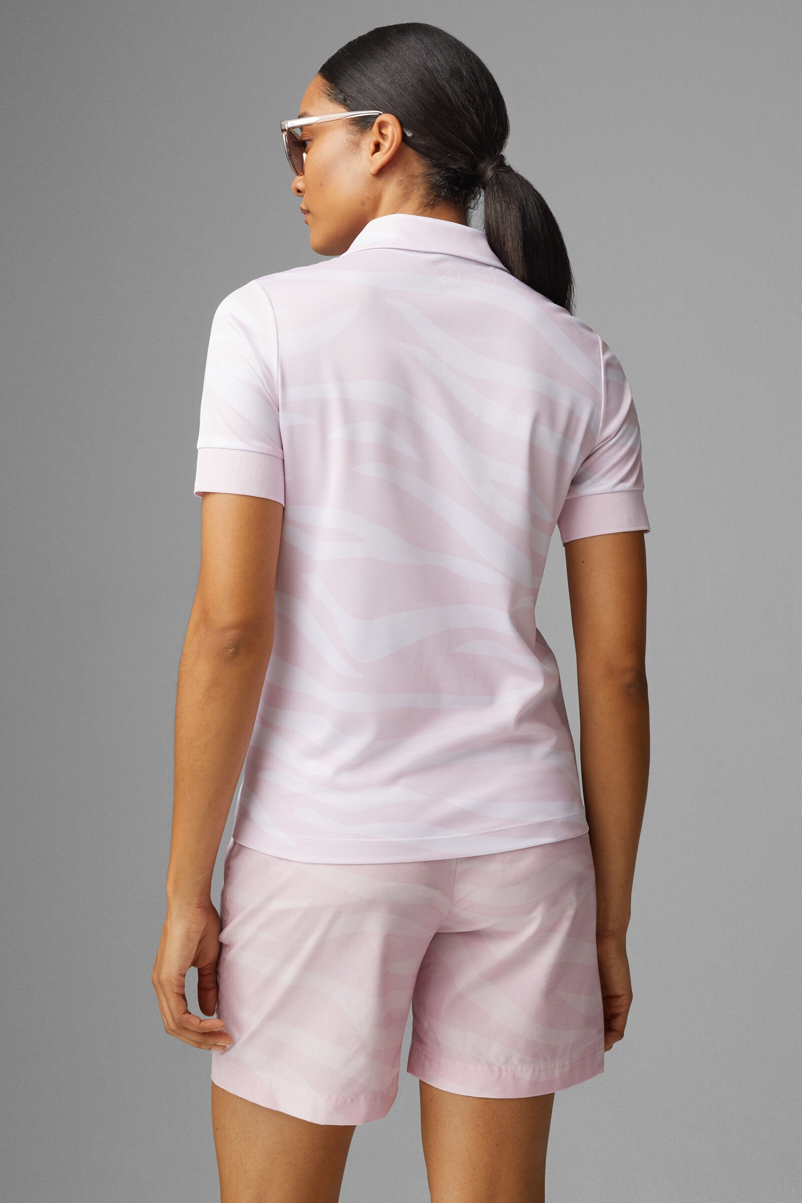 Calysa functional polo shirt in Pink - 3