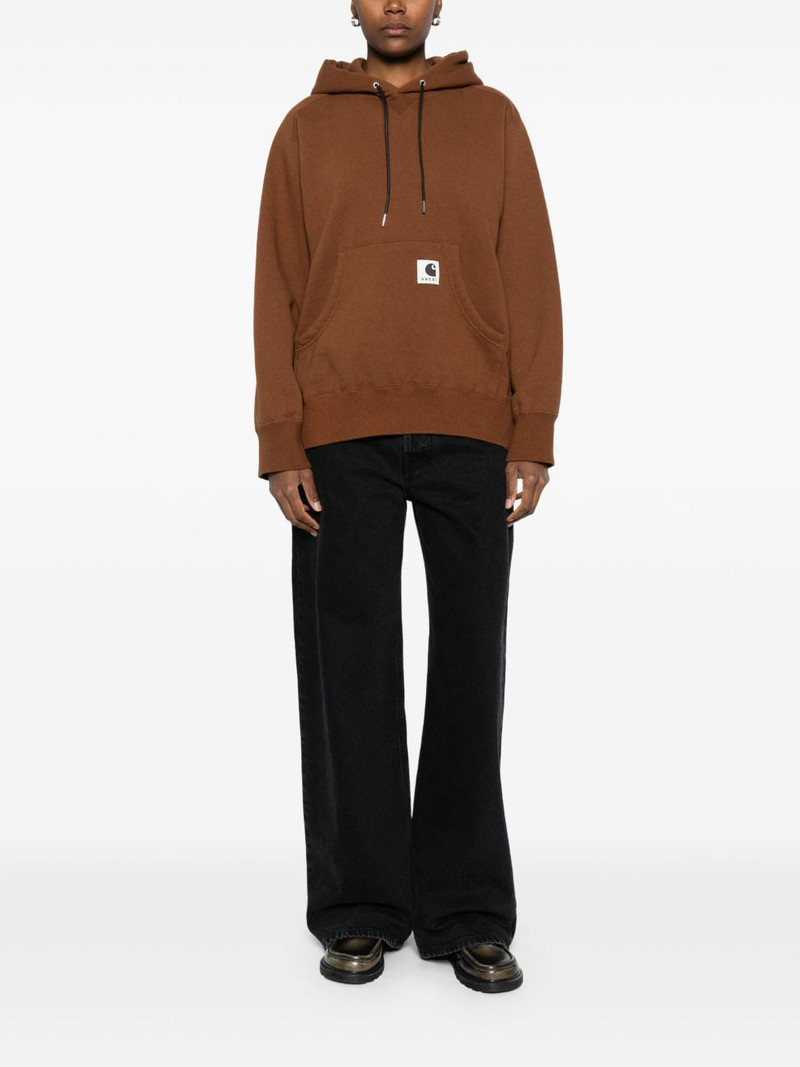 sacai x Carhartt WIP pocketed hoodie outlook