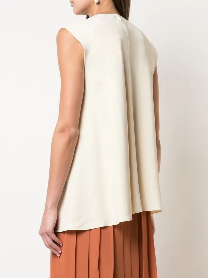 sleeveless flared blouse 4