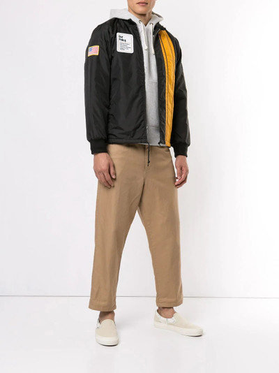 Supreme Pit Crew jacket outlook