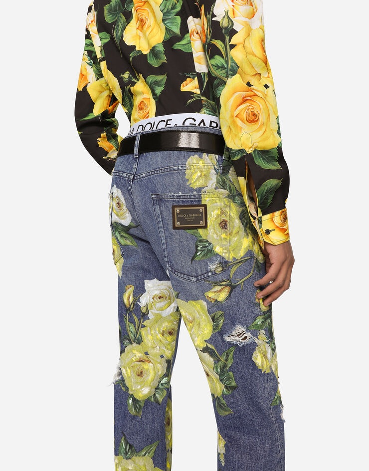 Loose blue denim jeans with all-over rose print - 5