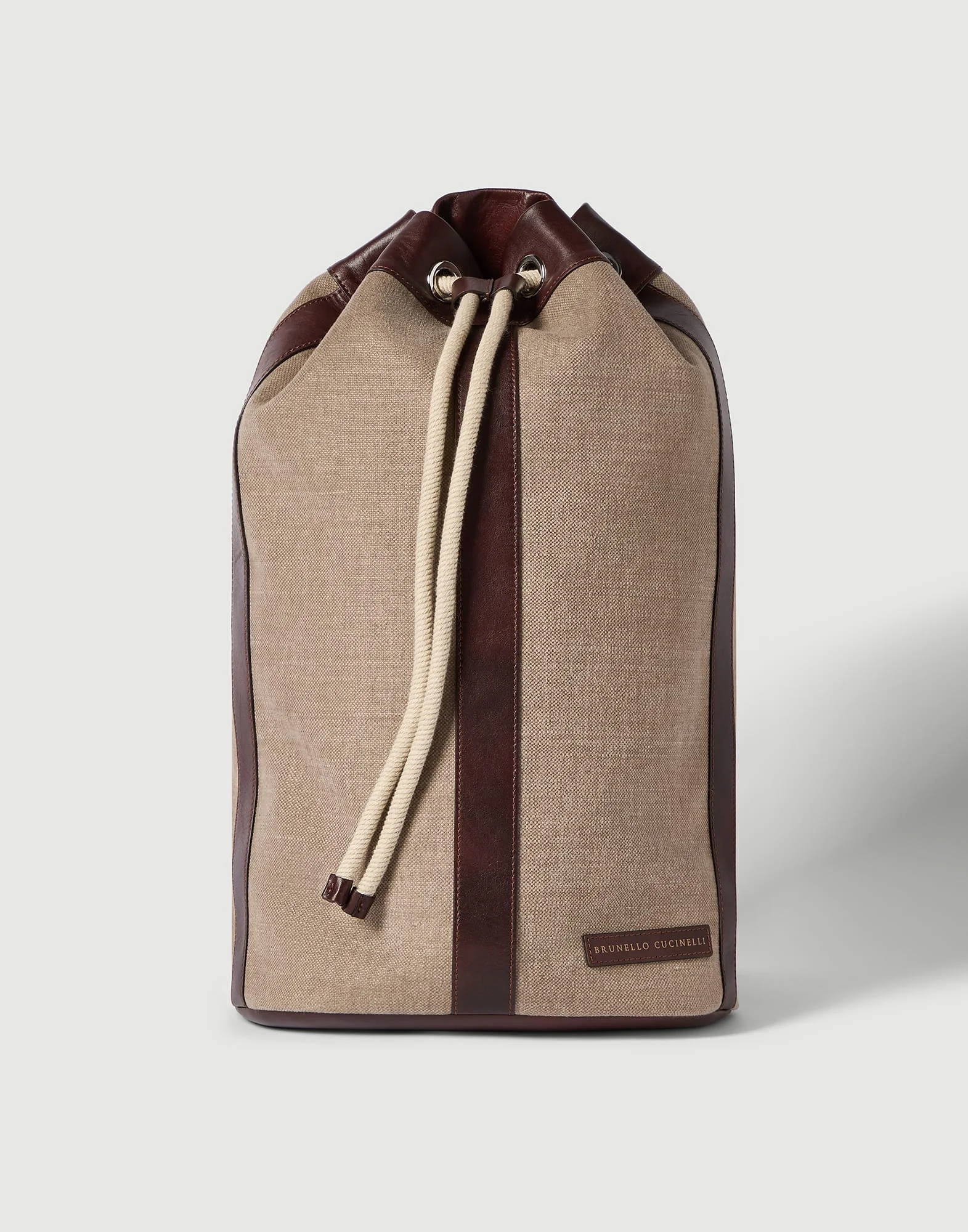 Water-resistant canvas and burnished calfskin drawstring backpack - 1