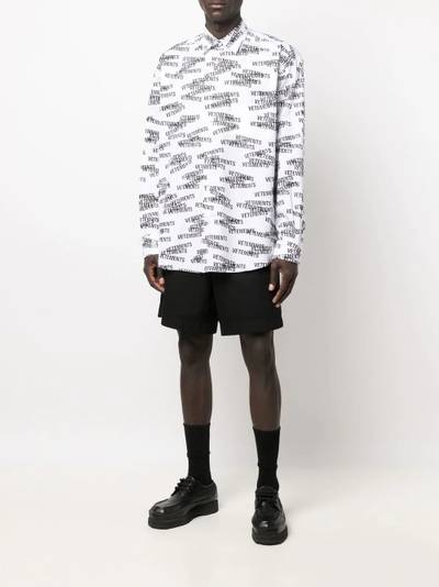 VETEMENTS logo-print button-up shirt outlook