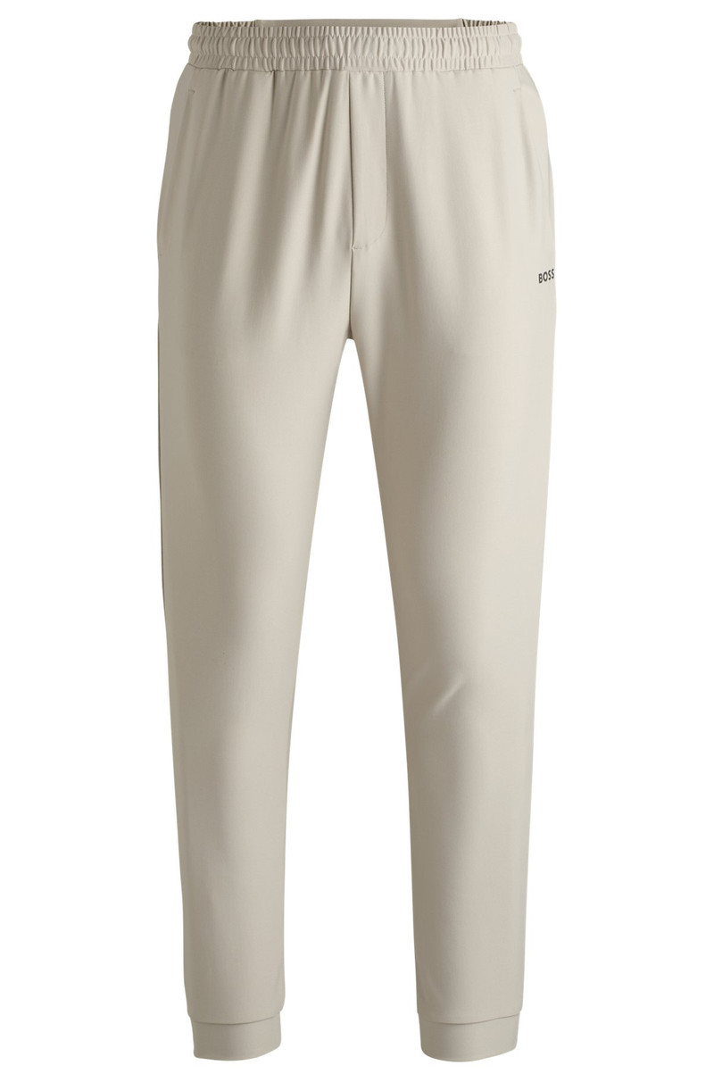 TRACKSUIT BOTTOMS IN STRETCH FABRIC WITH DECORATIVE REFLECTIVE LOGO 1