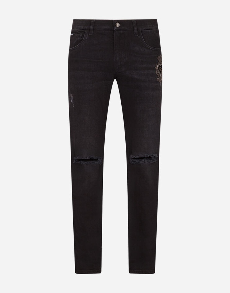 Washed black slim-fit stretch jeans with patch detailing 1