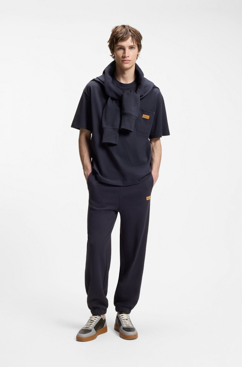HUGO LOOSE-FIT T-SHIRT IN COTTON WITH SUEDE LOGO BADGE outlook