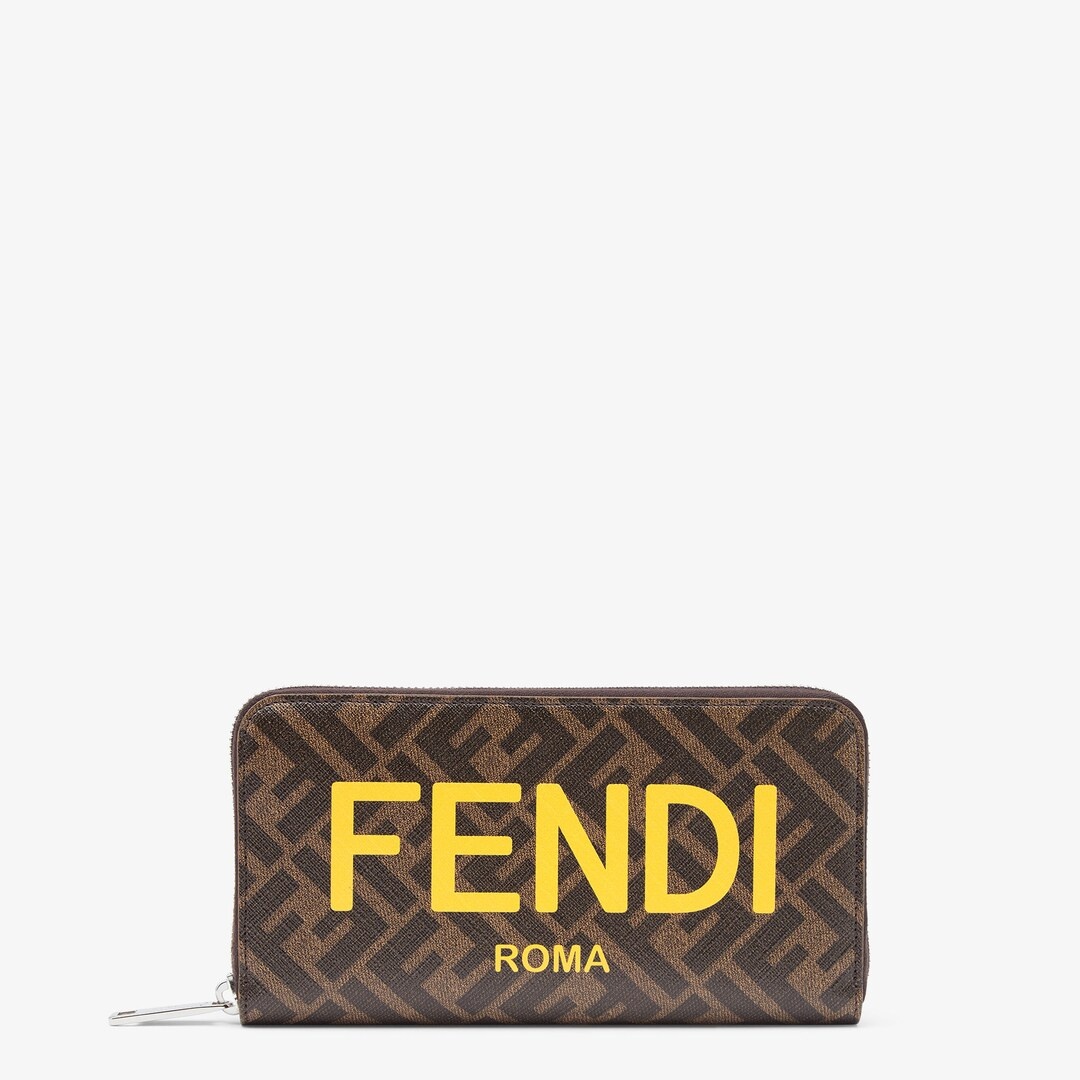 Rectangular continental wallet closed by zip on three sides. Organized into three gusseted compartme 1