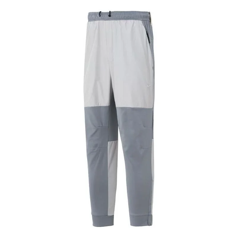 Nike Unlimited Water-Repellent Zippered Cuff Versatile Pants Asia Sizing 'Grey White' FB8602-084 - 1