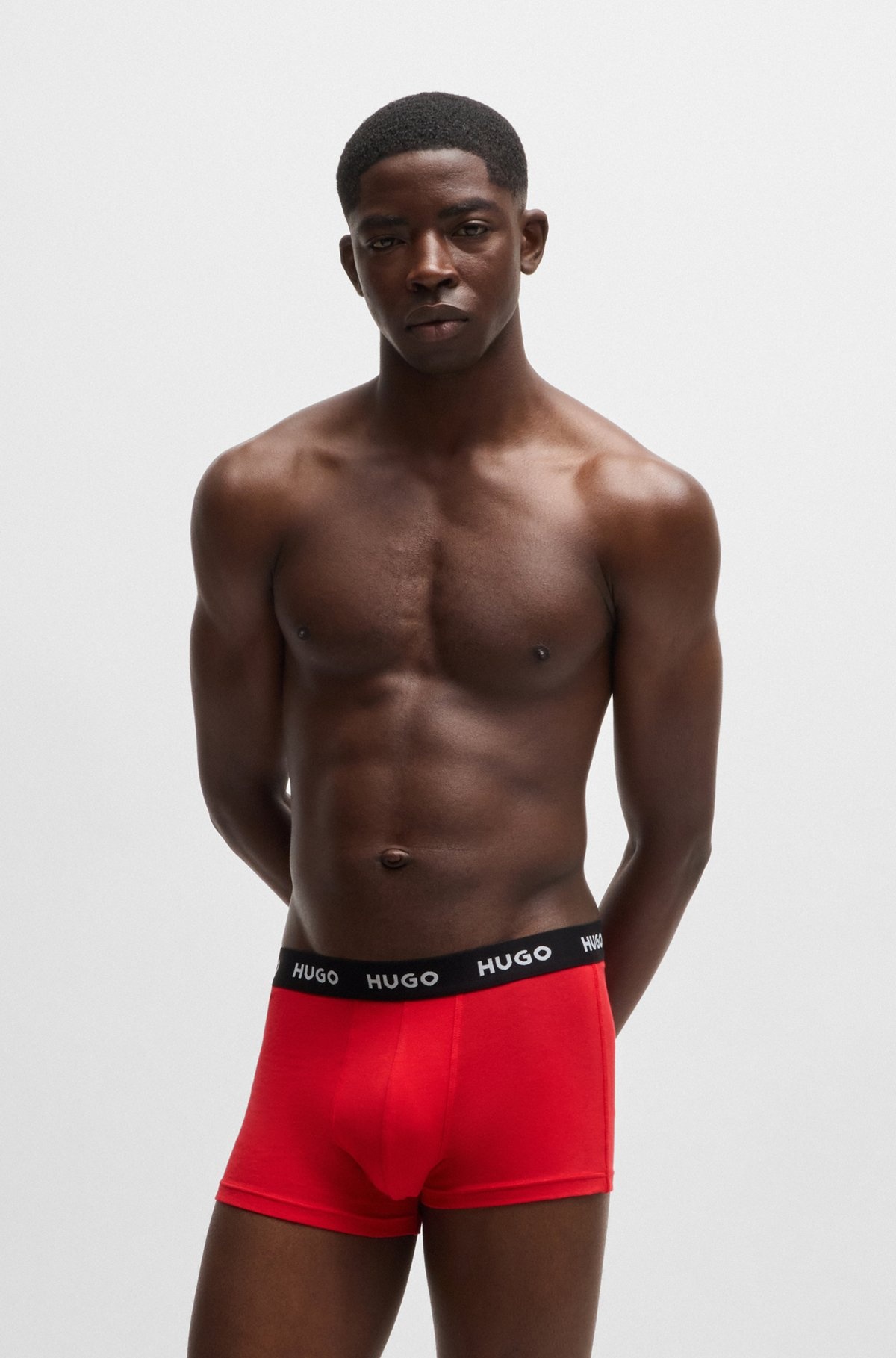 THREE-PACK OF STRETCH-COTTON TRUNKS WITH LOGO WAISTBANDS - 6