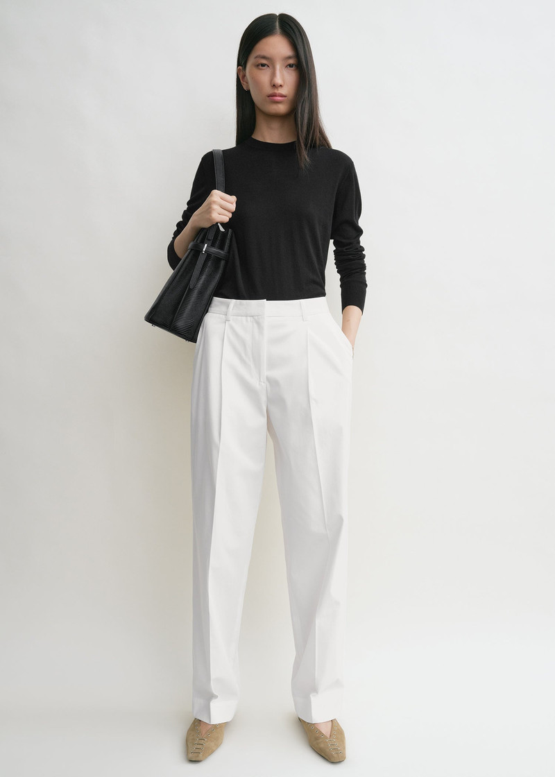 Totême Slanted pocket trousers white outlook