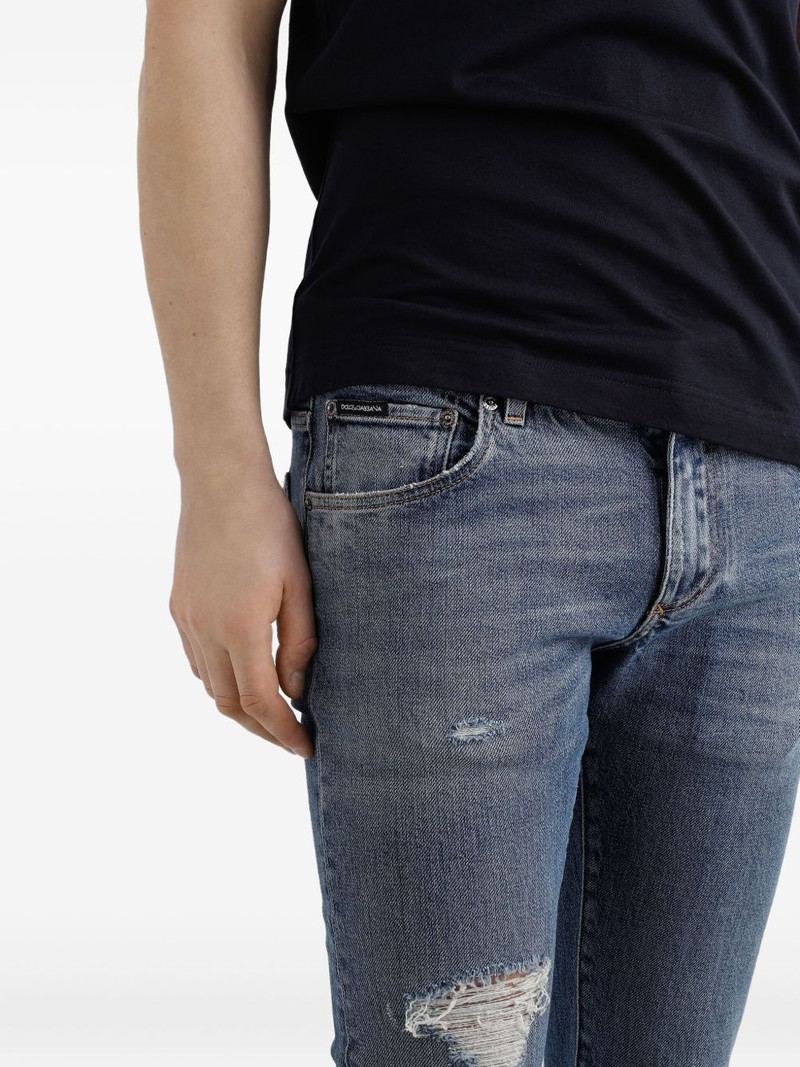 distressed logo-plaque jeans 5
