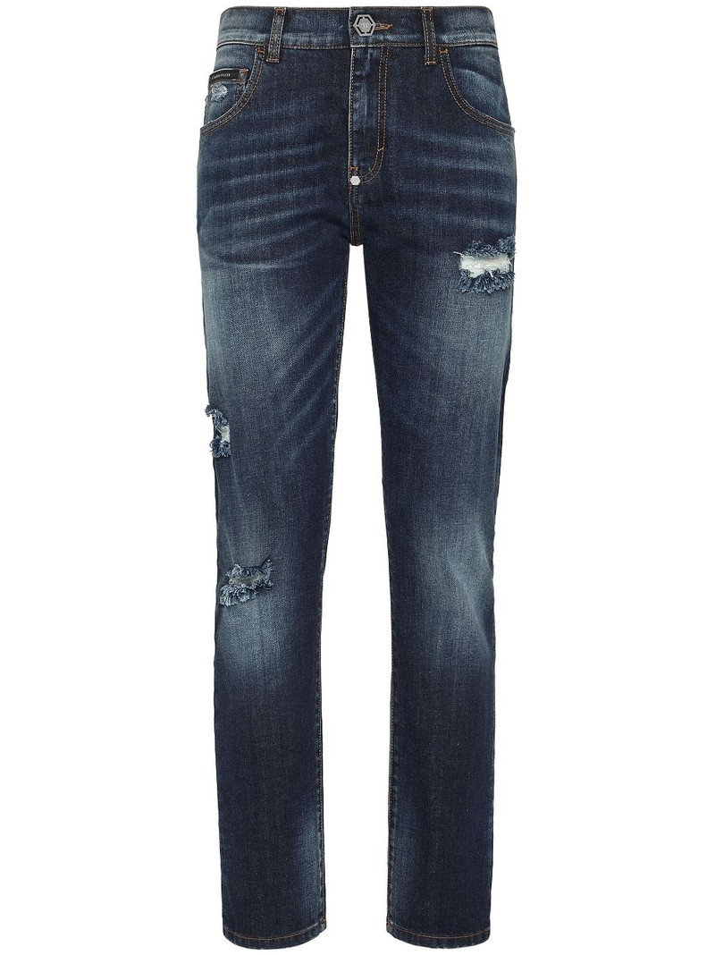 distressed-effect denim trousers 1