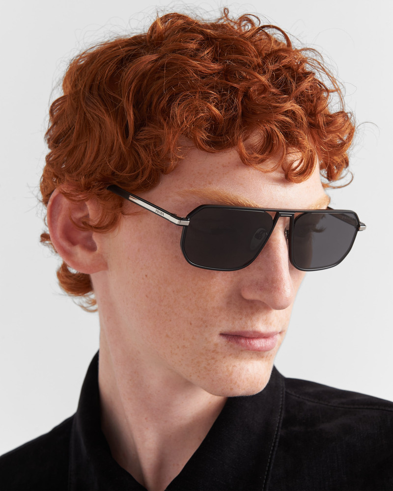 Prada Sunglasses with iconic metal plaque outlook