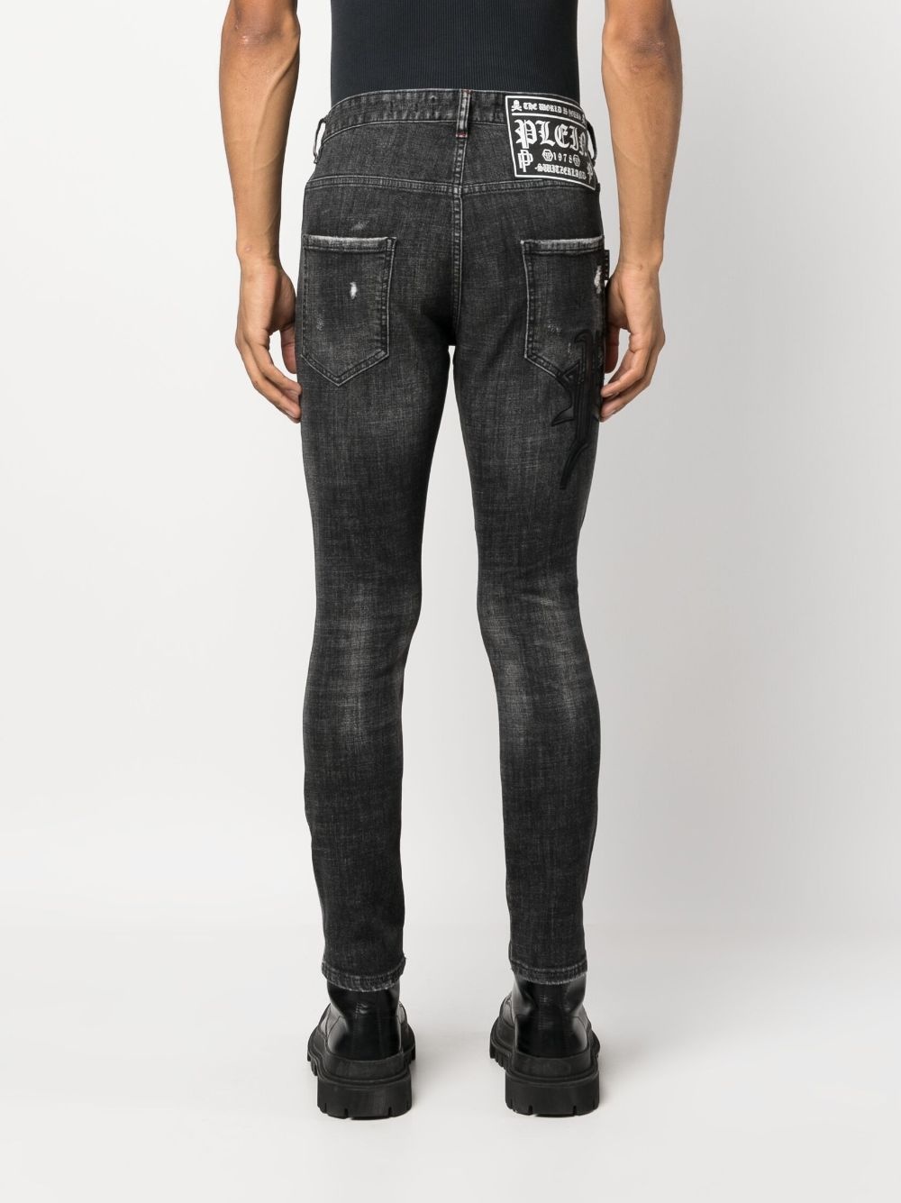 Skull & Bones logo-embroidered ripped jeans - 4