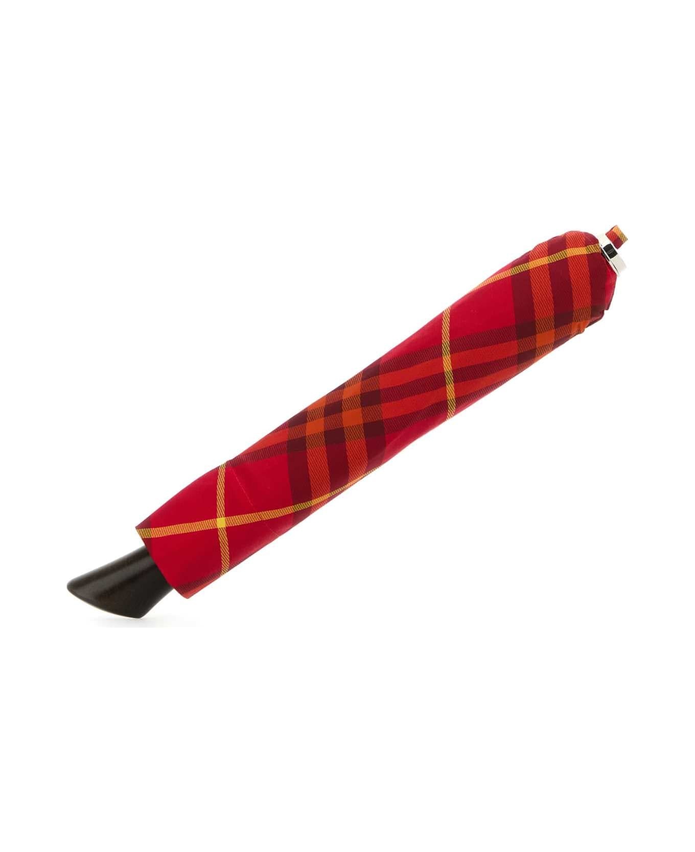 傘・レイングッズ BURBERRY PRINTED NYLON UMBRELLA Burberry Printed Nylon Umbrella | italist | REVERSIBLE